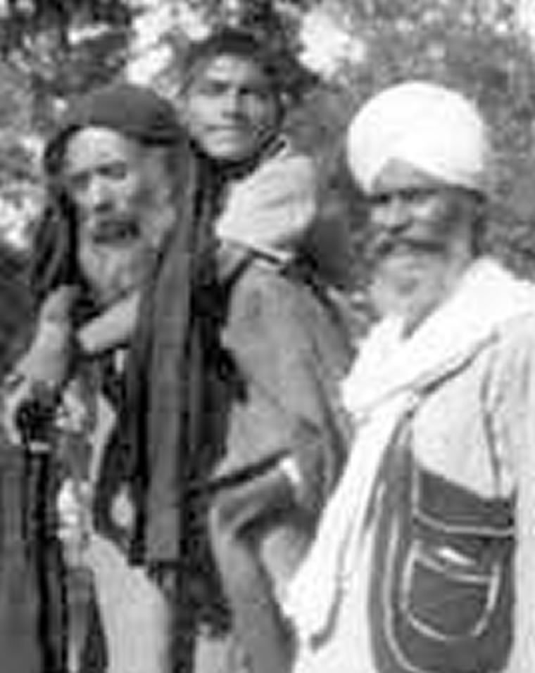Bhagat Puran Singh carrying Piara